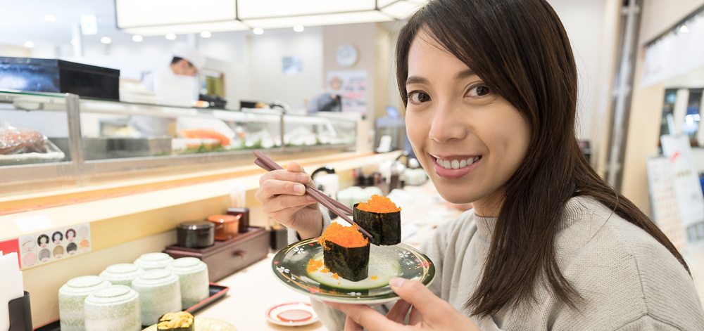 woman-enjoy-sushi-in-restaurant-2022-09-16-03-52-35-utc-retouches